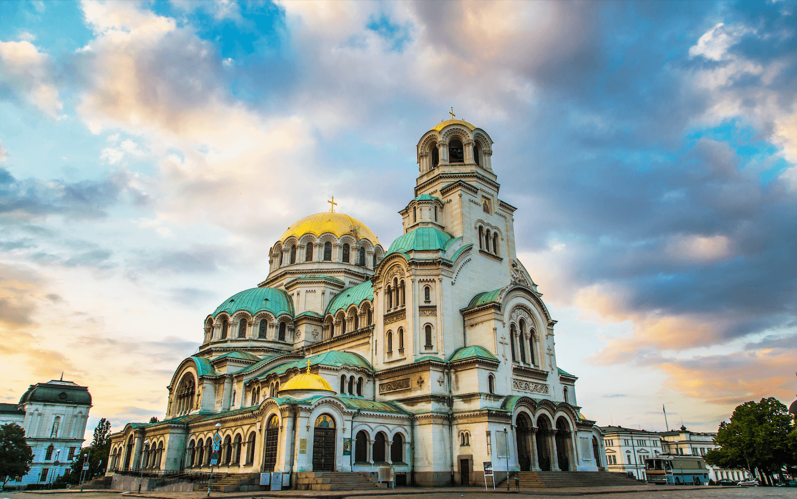 St. Alexander Nevsky Cathedral in the center of Sofia, capital of Bulgaria against the blue morning sky with colorful clouds